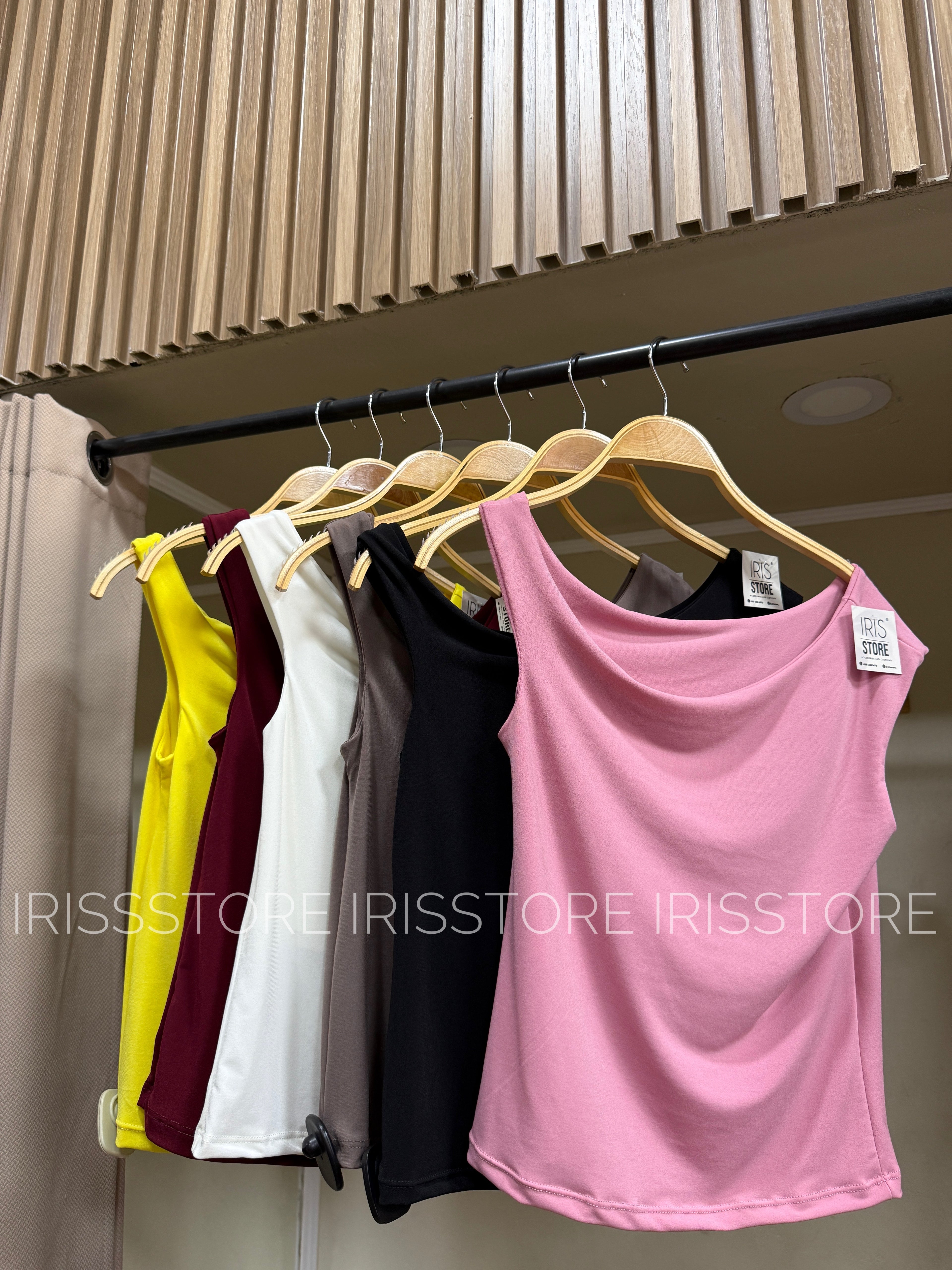 Top asimetrico doble tela